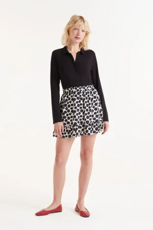 Falda corta lunares negros