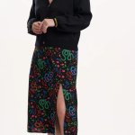 Falda midi flores y serpientes