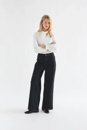 Pantalón vaquero negro con bolsillos de corazones